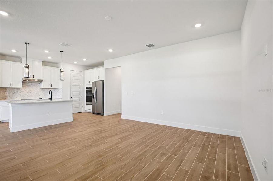 Spacious, unfurnished interior of a new home in Magnolia Bay - Reserve Series, Nokomis (Image 31).