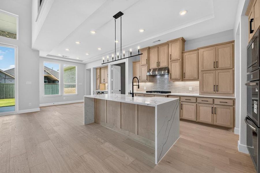 Furnished interior view inside a new home in Pecan Square, Northlake (Image 4).