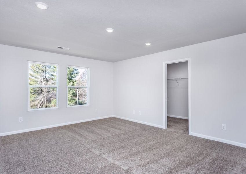 The master bedroom has enough space for king sized furniture