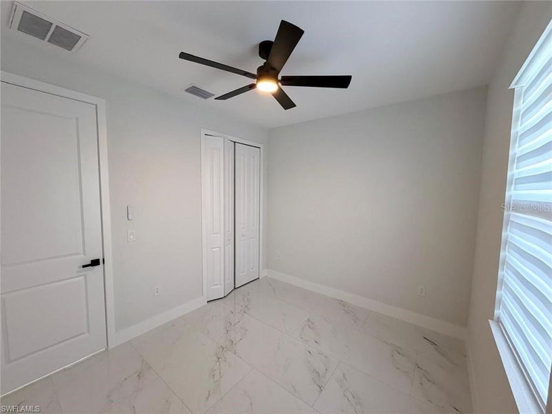 Spacious, unfurnished interior of a new home in , Lehigh Acres (Image 25).