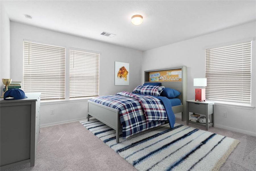 Secondary bedroom features plush carpet, neutral paint, lighting, large window with privacy blinds and ample sized closet space.