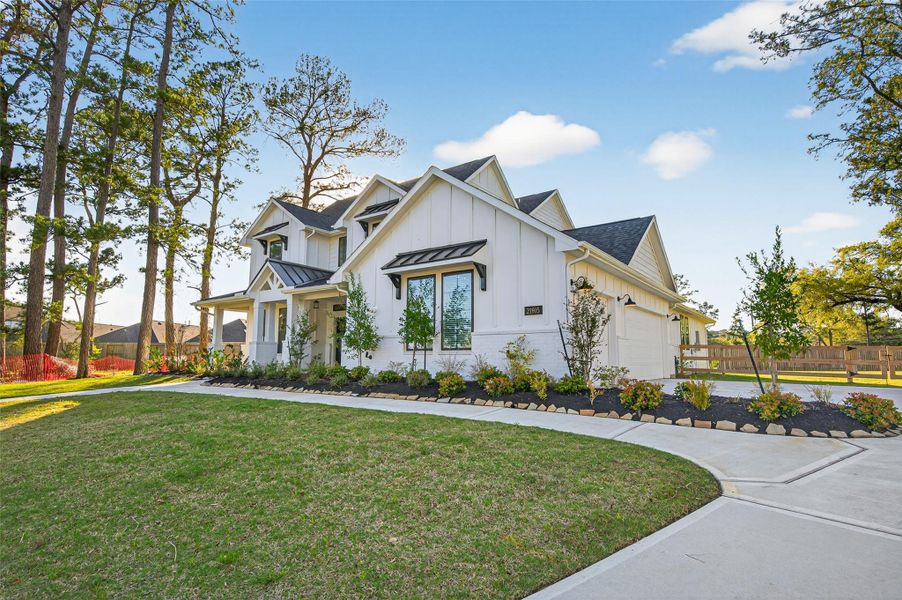 Front exterior of a new home in Sorella, Tomball, TX, highlighting curb appeal (Image 25).