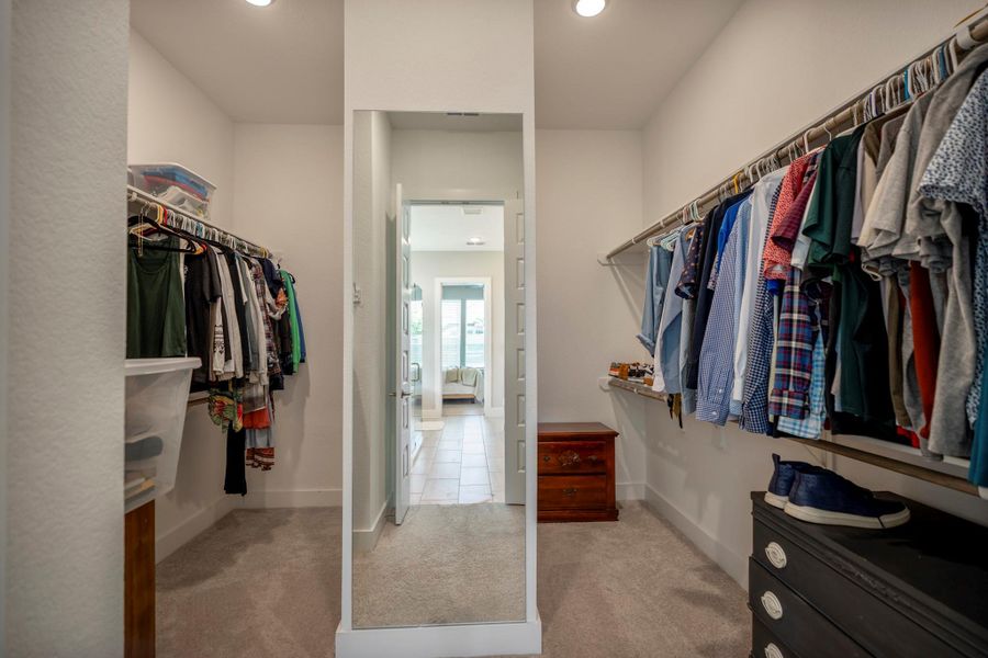 This double-wide walk-in closet is thoughtfully designed to keep everything organized, with plenty of room for clothing, shoes and everyday essentials.