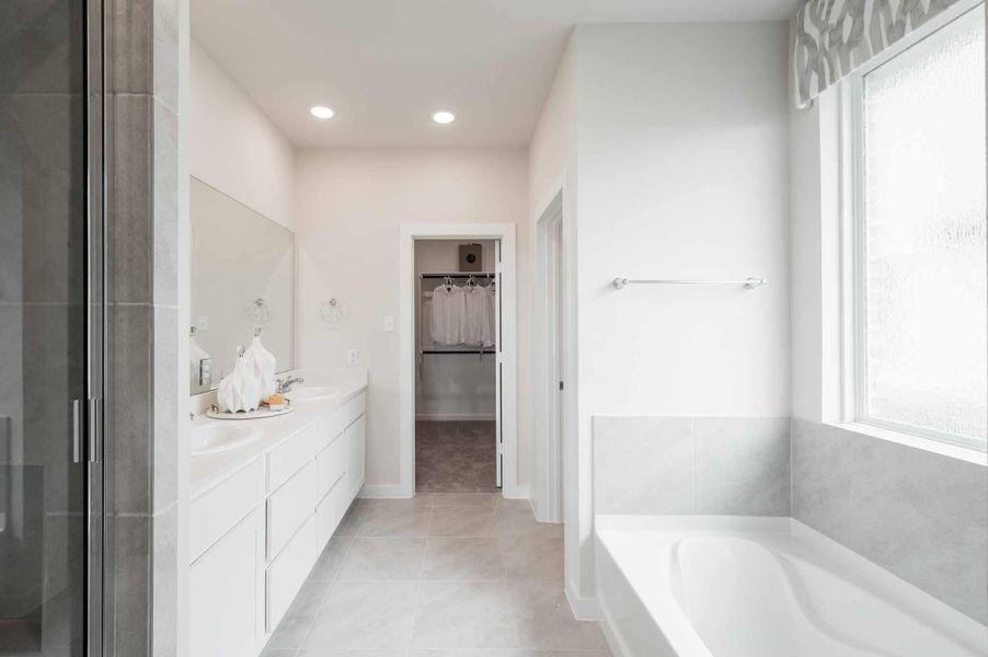 Furnished interior view inside a new home in Mason Woods, Cypress (Image 9).