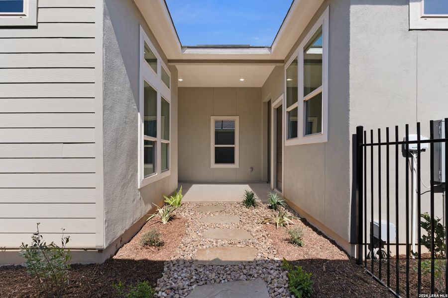 Exterior details and patio area of a home in Davis Ranch, San Antonio (Image 19).