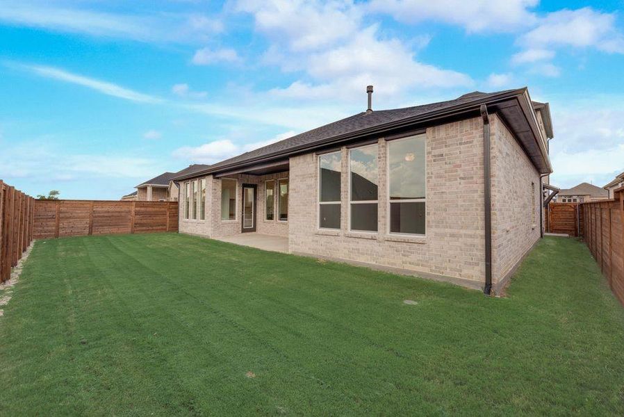 Exterior details and patio area of a home in Solterra Texas, Mesquite (Image 4).