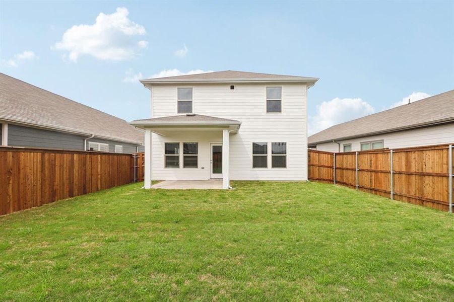 Exterior details and patio area of a home in Lakehaven - Spring Series, Farmersville (Image 22).