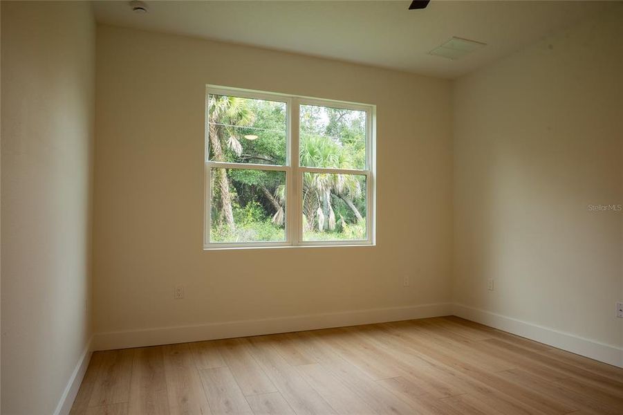 Spacious, unfurnished interior of a new home in , Port Charlotte (Image 18).