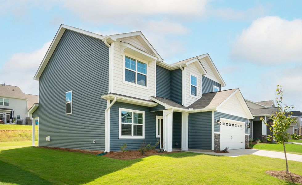 Representative exterior photo of a completed home built from the The McKee by Cothran Homes in Holly Ridge, Greenville, SC (Image 30). Representative exterior photo of a completed home built from the The McKee by Cothran Homes in Holly Ridge, Greenville, SC (Image 30).