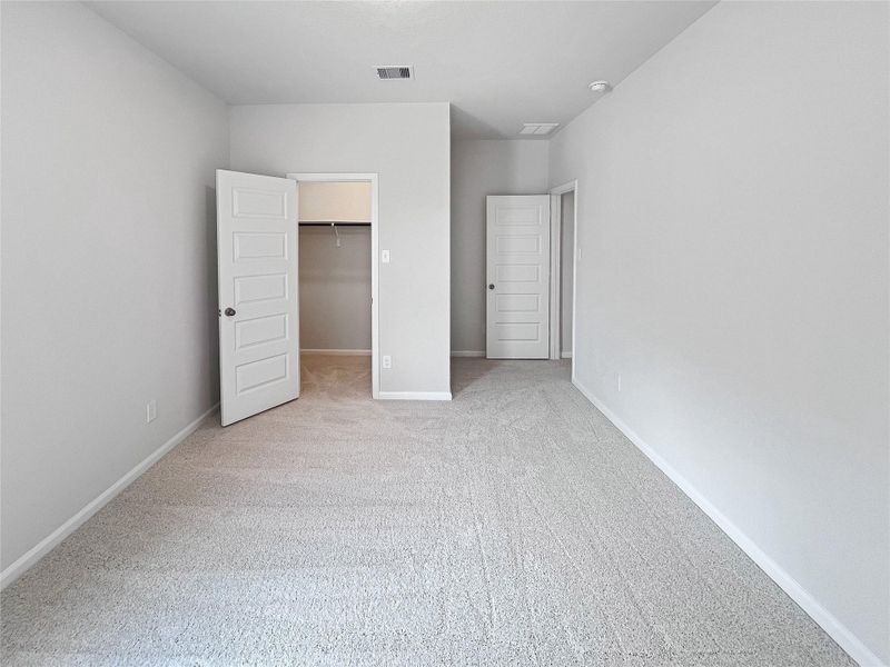 The Caldwell- Bedroom 4. Sample image for illustration; upgrades, options, and colors may vary.