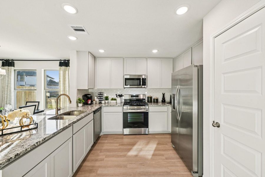 Furnished interior view inside a new home in The Landing, New Caney (Image 32).