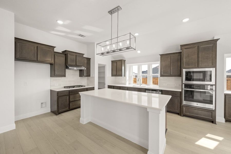Representative furnished interior of a home built from the Sandstone II by Pacesetter Homes in Timberbrook, Justin (Image 5).