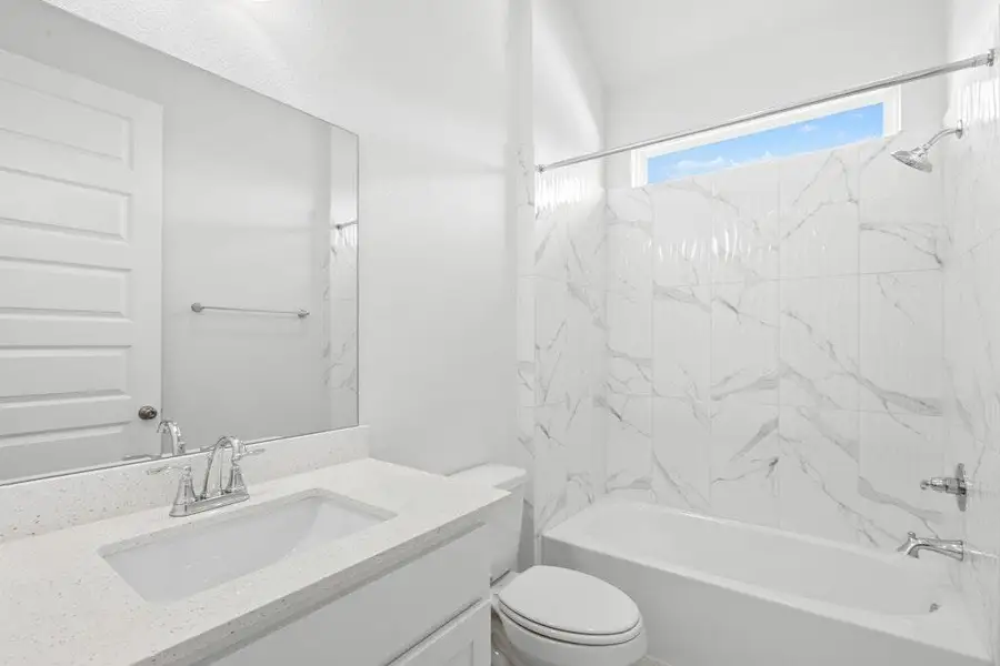 Furnished interior view inside a new home in The Colony, Bastrop (Image 10).