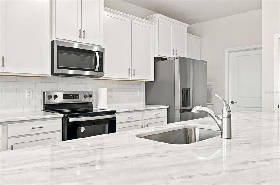 Furnished interior view inside a new home in Star Farms at Lakewood Ranch, Bradenton (Image 17).