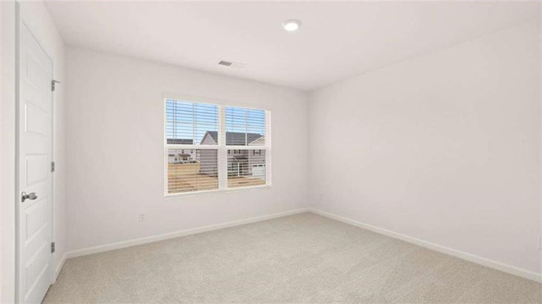 Spacious, unfurnished interior of a new home in Preserve at Dove Creek, Statham (Image 34). Spacious, unfurnished interior of a new home in Preserve at Dove Creek, Statham (Image 34).