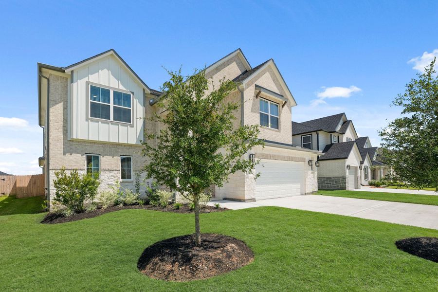 Front exterior of a new home in Briarwood Crossing, Rosenberg, TX, highlighting curb appeal (Image 12). Front exterior of a new home in Briarwood Crossing, Rosenberg, TX, highlighting curb appeal (Image 12).