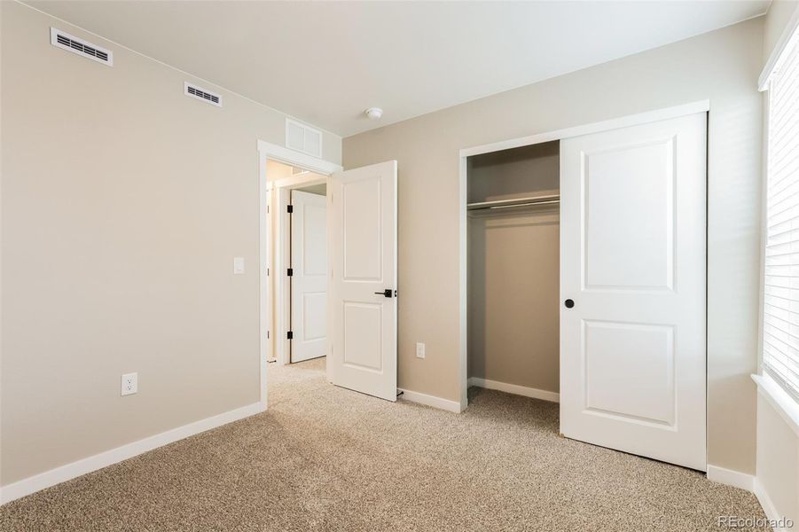 Spacious, unfurnished interior of a new home in Second Creek Farm, Commerce City (Image 16).