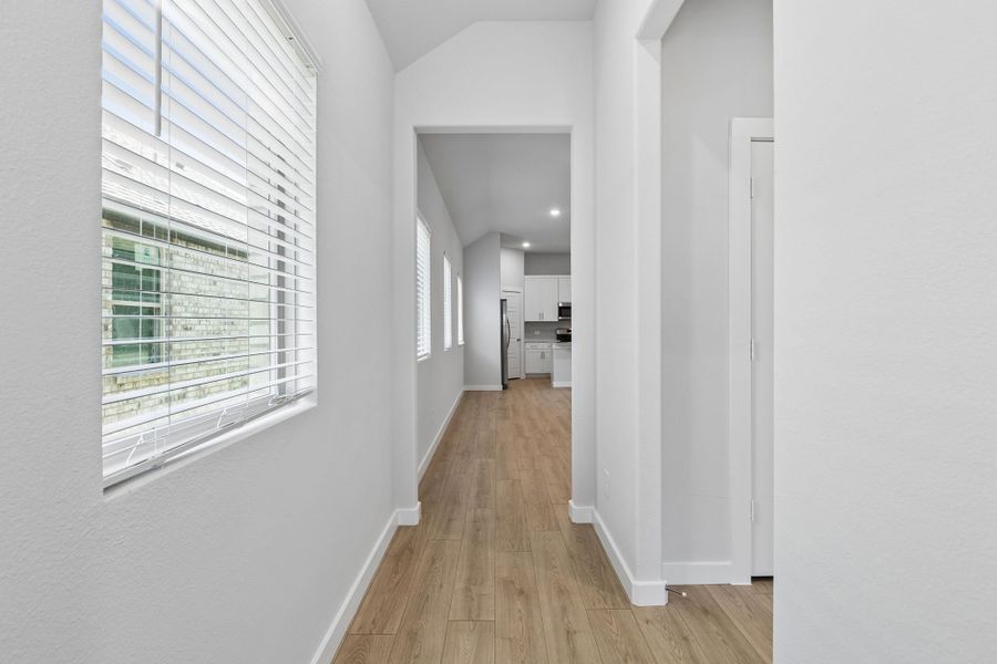 Entryway in the Cypress home plan by Trophy Signature Homes - REPRESENTATIVE PHOTO
