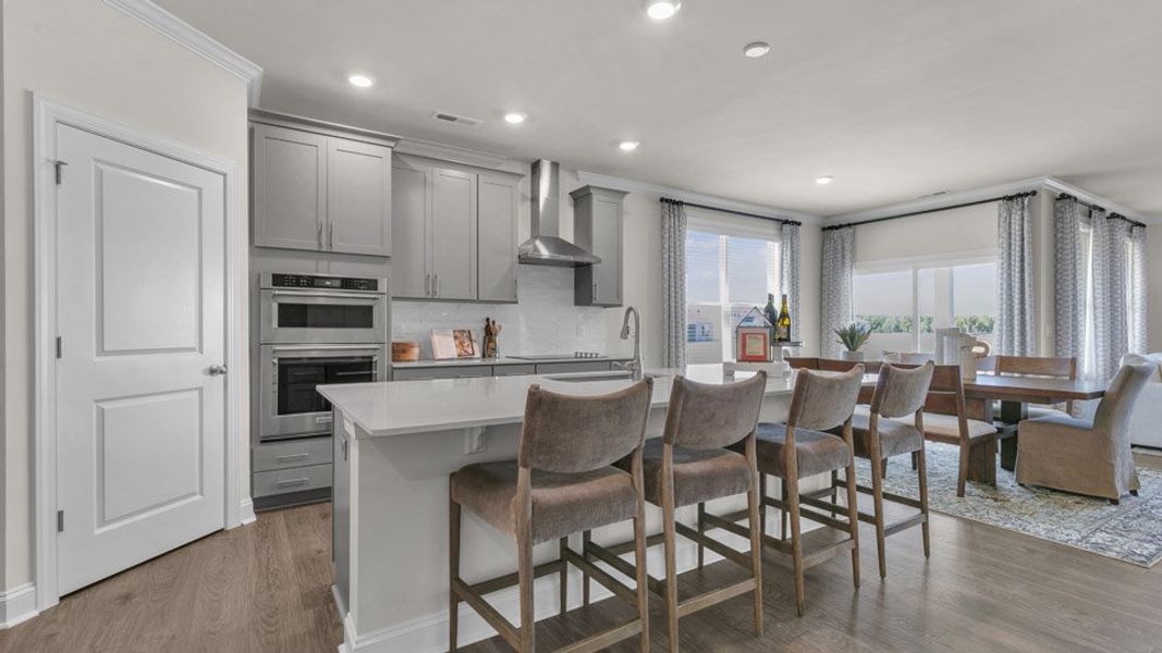 Representative furnished interior of a home built from the HARTWELL by D.R. Horton in Eagle Creek, Fuquay Varina (Image 9).