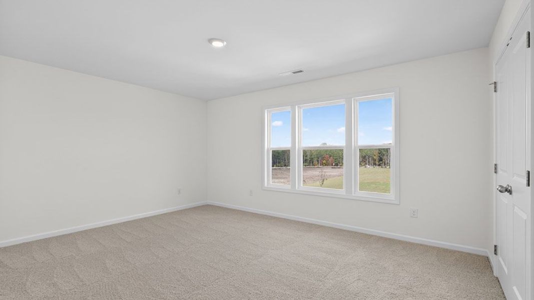 Representative unfurnished interior of a home built from the Hampshire by D.R. Horton in Kalas Falls, Wake Forest (Image 26).