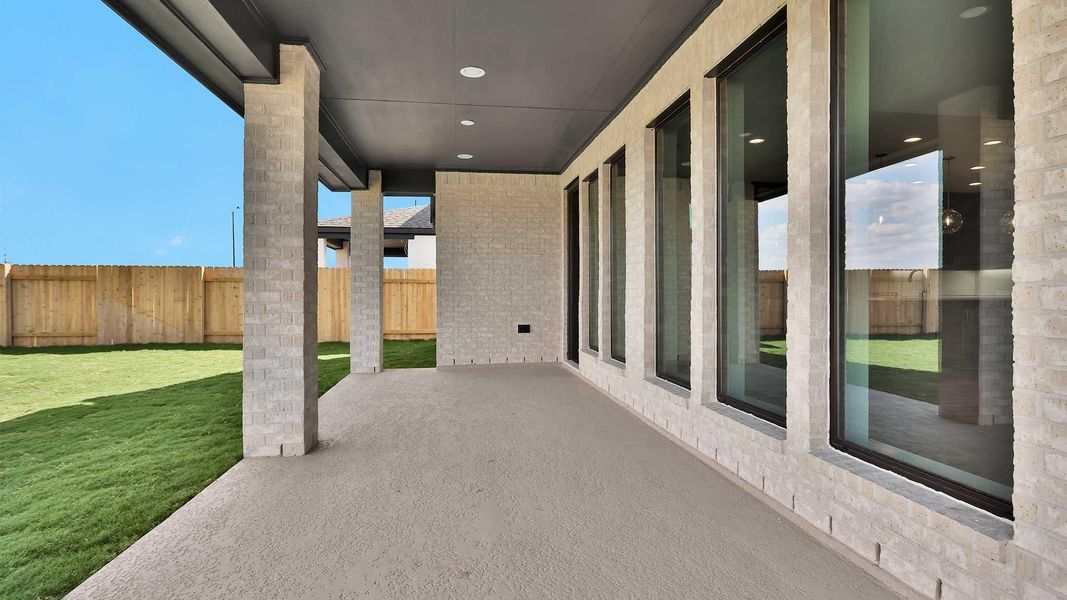 Exterior details and patio area of a home in Elyson 70', Katy (Image 3). Exterior details and patio area of a home in Elyson 70', Katy (Image 3).