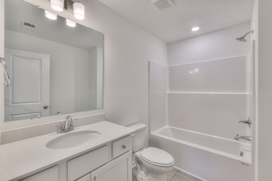 *Photo of example home. Selections & Finishes May Vary.