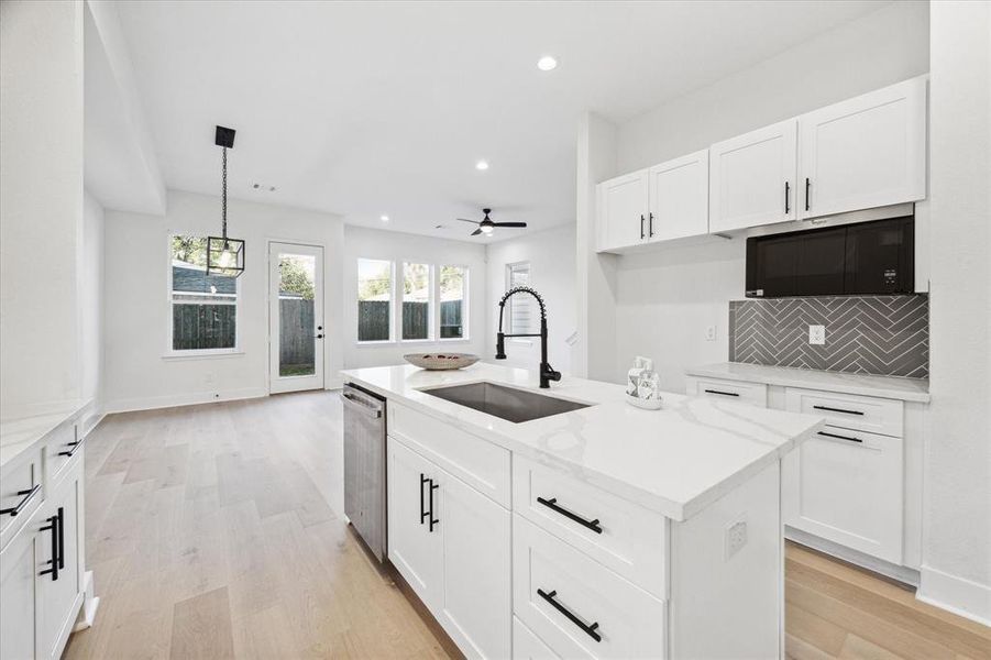 Quartz counters & stainless steel appliances for a modern touch & practicality