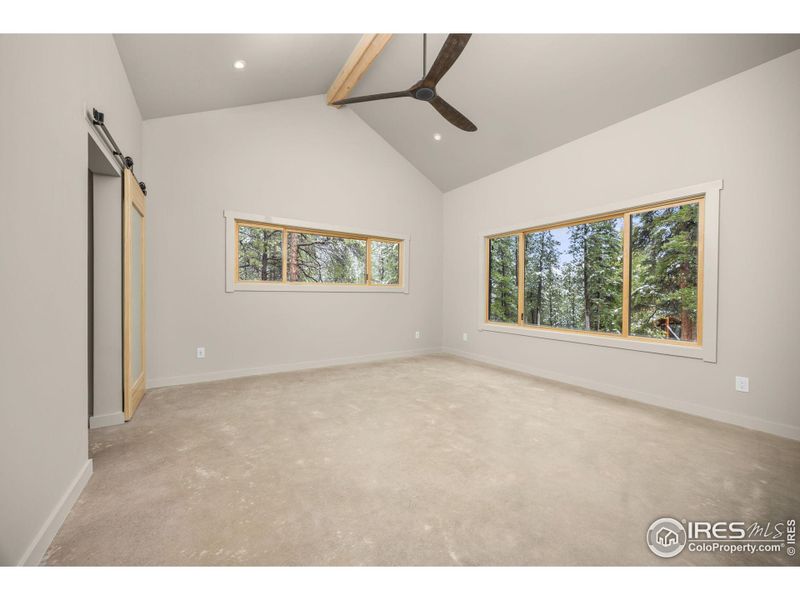 Primary Bedroom large windows bring in natural light Primary Bedroom large windows bring in natural light