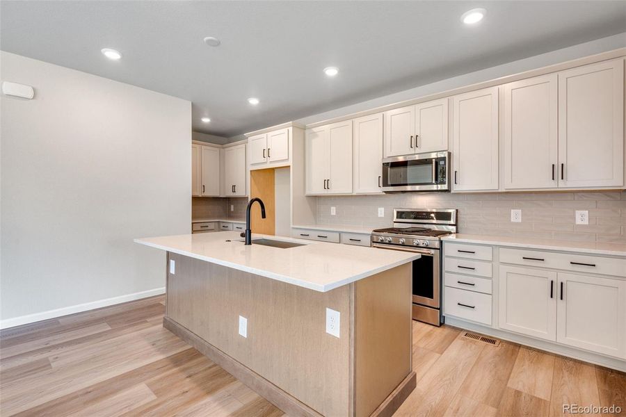 Furnished interior view inside a new home in Wild Oak at The Canyons, Castle Pines (Image 7). Furnished interior view inside a new home in Wild Oak at The Canyons, Castle Pines (Image 7).