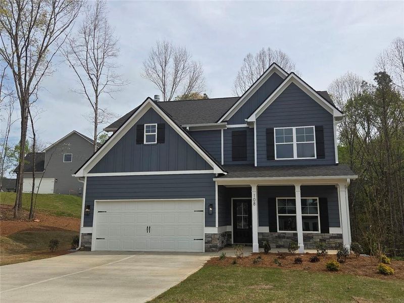 Front exterior of a new home in , Dallas, GA, highlighting curb appeal (Image 1). Front exterior of a new home in , Dallas, GA, highlighting curb appeal (Image 1).