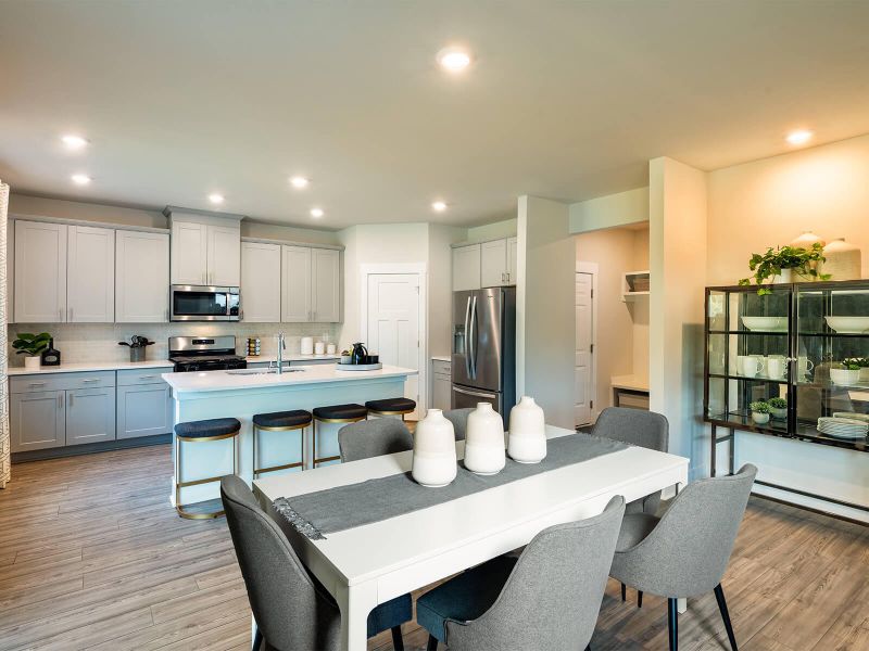 Furnished interior view inside a new home in The Coves at Lakes of Cane Bay II, Summerville (Image 4). Furnished interior view inside a new home in The Coves at Lakes of Cane Bay II, Summerville (Image 4).