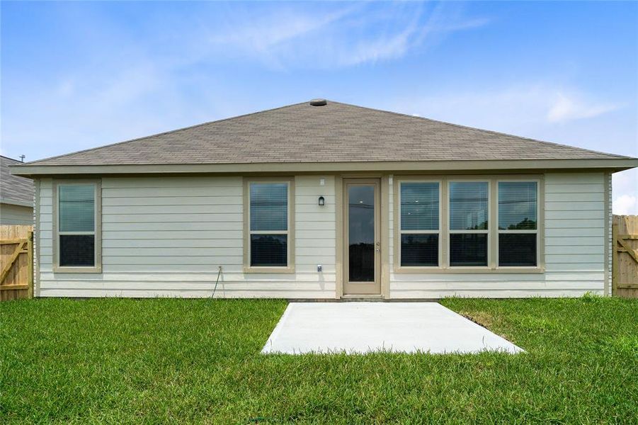 This backyard is enjoyable for everyone! From pets playing, kids jumping on the trampoline, or even having a garden, this amazing backyard provides space for endless activities for the whole family!