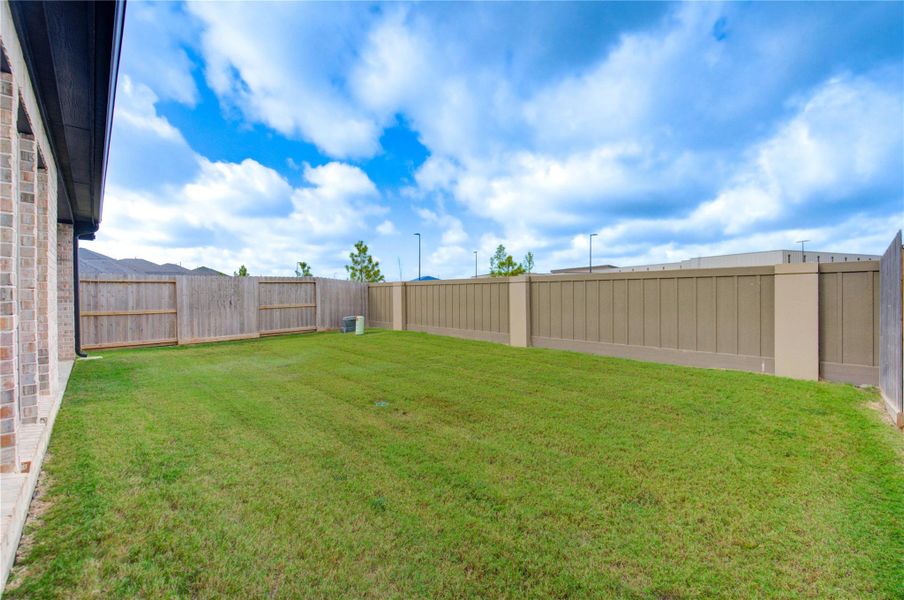 Exterior details and patio area of a home in Cross Creek West 45', Fulshear (Image 21). Exterior details and patio area of a home in Cross Creek West 45', Fulshear (Image 21).