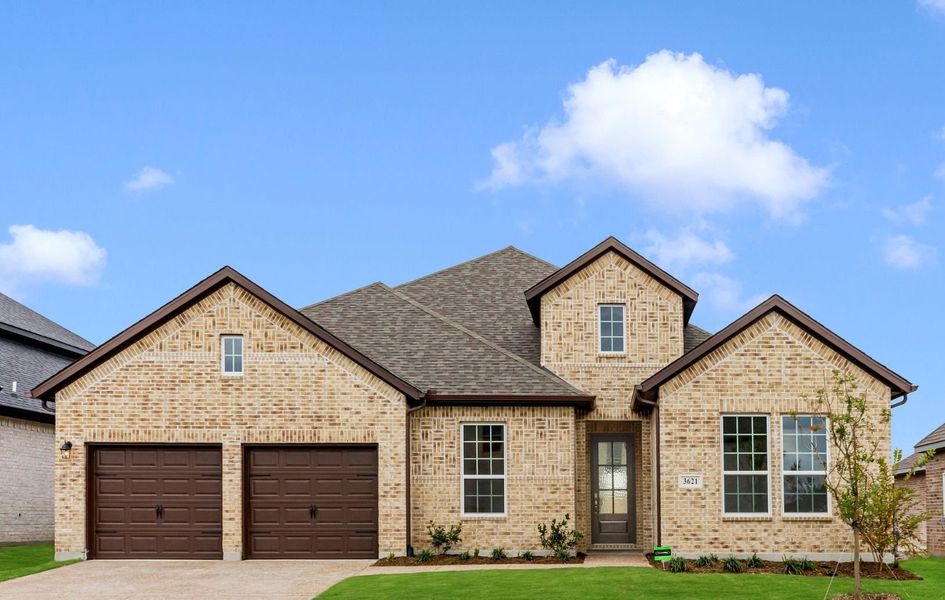Front exterior of a home in the Edgewater community, located in Fate, TX (Image 3). Front exterior of a home in the Edgewater community, located in Fate, TX (Image 3).