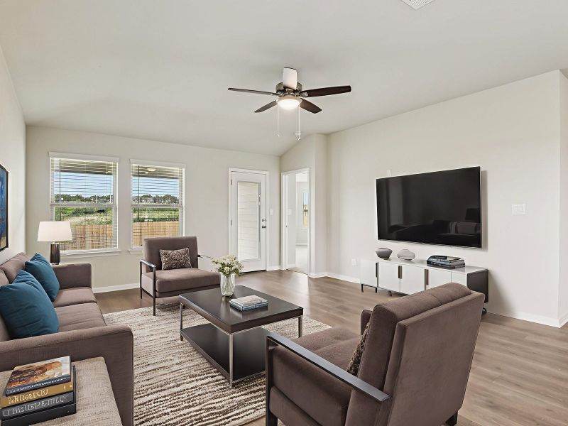 Virtually staged living room in the Oleander floorplan at a Meritage Homes community.