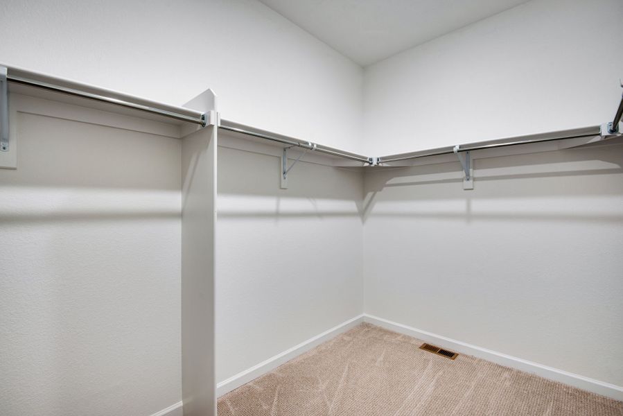 Spacious, unfurnished interior of a new home in Ensemble at The Aurora Highlands, Aurora (Image 11).