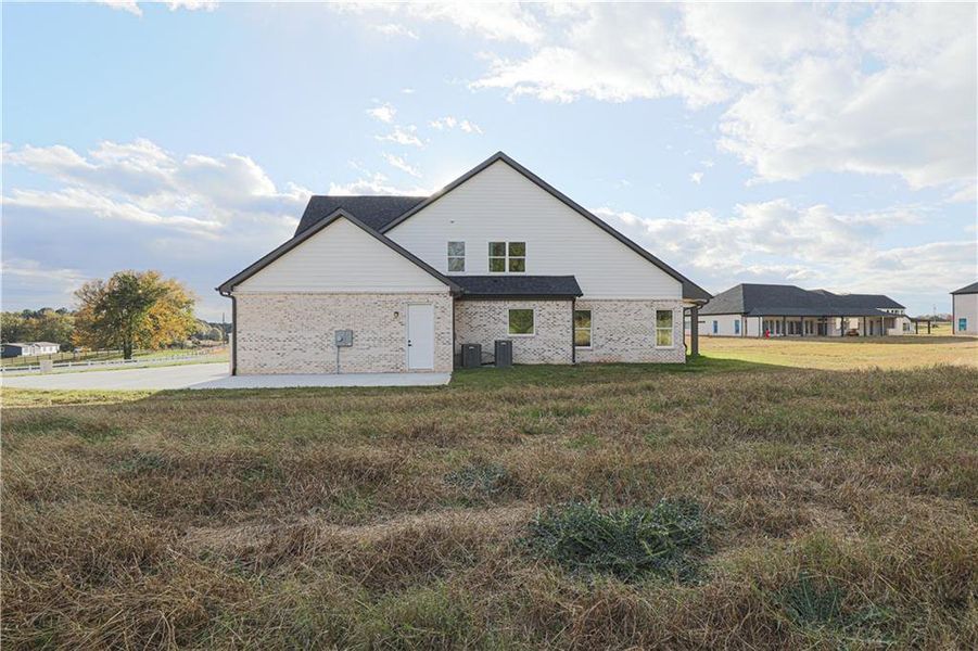 Front exterior of a new home in , Maysville, GA, highlighting curb appeal (Image 2). Front exterior of a new home in , Maysville, GA, highlighting curb appeal (Image 2).