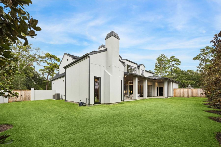 Exterior details and patio area of a home in , Houston (Image 3).