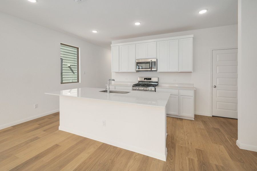 Furnished interior view inside a new home in Trinity Ranch, Elgin (Image 8).