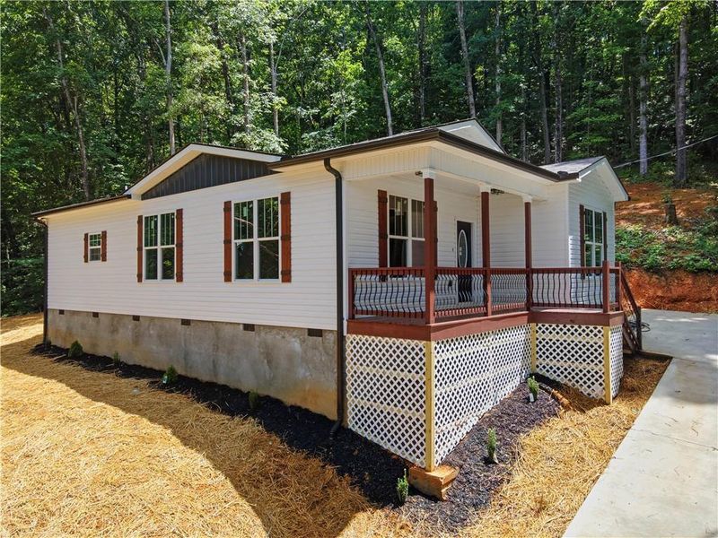 Exterior details and patio area of a home in , Calhoun (Image 21).