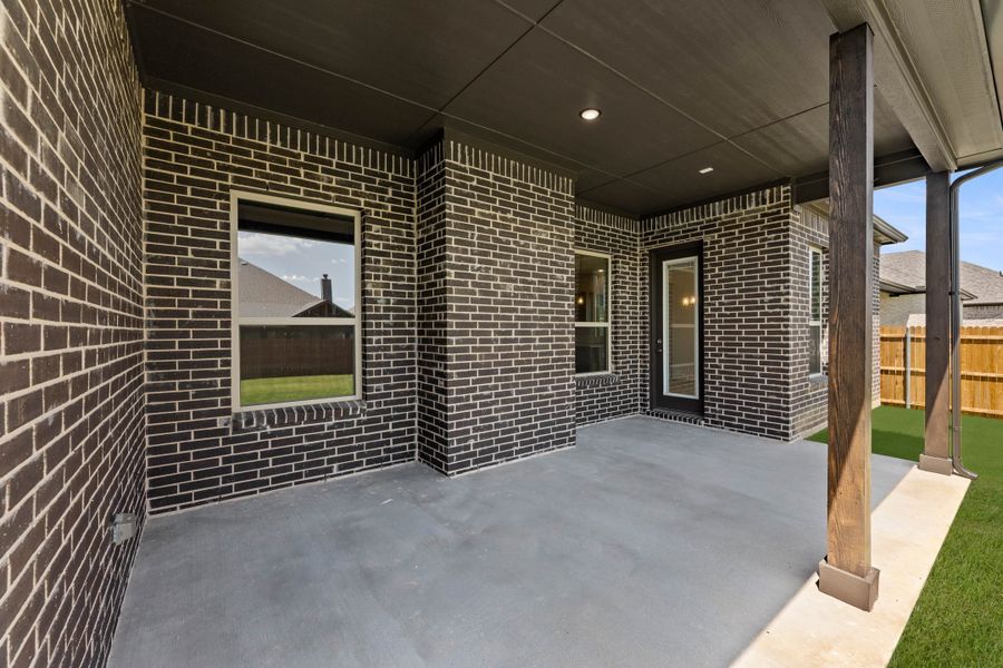 Exterior details and patio area of a home in Timberbrook, Justin (Image 3).