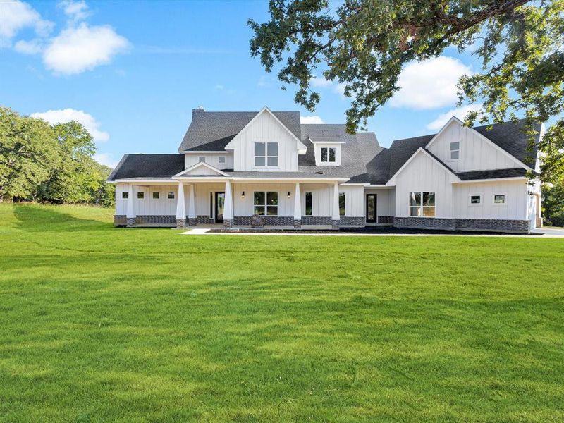 Front exterior of a new home in , Sunset, TX, highlighting curb appeal (Image 22). Front exterior of a new home in , Sunset, TX, highlighting curb appeal (Image 22).