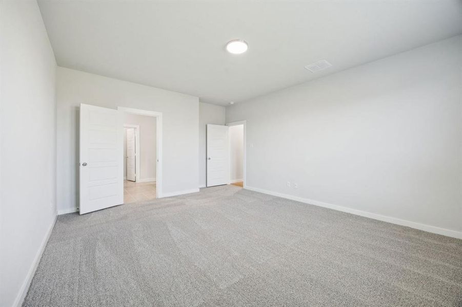 Primary Suite in the Masters home plan by Trophy Signature Homes – REPRESENTATIVE PHOTO Primary Suite in the Masters home plan by Trophy Signature Homes – REPRESENTATIVE PHOTO