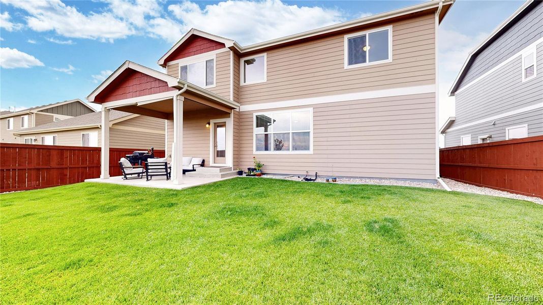 Front exterior of a new home in Ravina, Windsor, CO, highlighting curb appeal (Image 1). Front exterior of a new home in Ravina, Windsor, CO, highlighting curb appeal (Image 1).