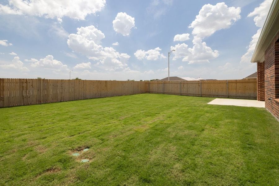 Exterior details and patio area of a home in Overlook Ranch, Georgetown (Image 20).