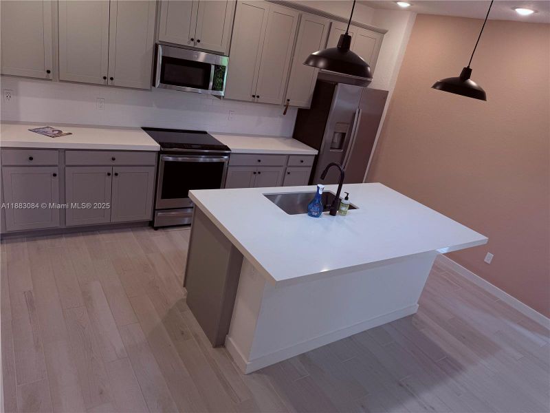 Furnished interior view inside a new home in , Port St. Lucie (Image 5).