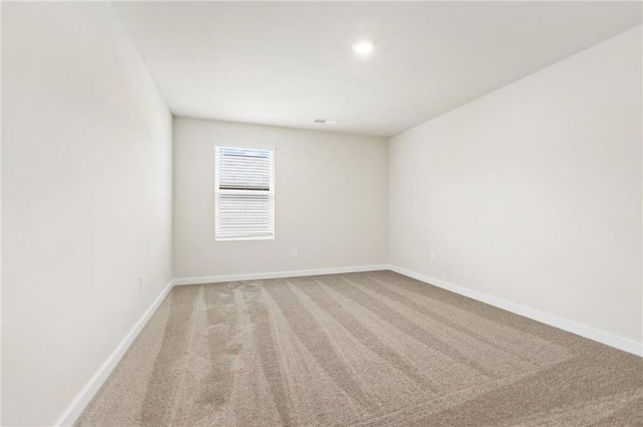 Spacious, unfurnished interior of a new home in Fern Dale, Fairburn (Image 18).