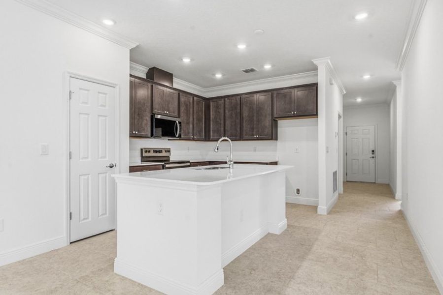 Furnished interior view inside a new home in Eden Hills, Lake Alfred (Image 13).