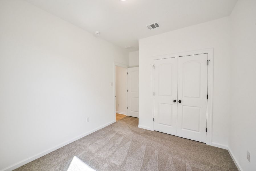 Spacious, unfurnished interior of a new home in Mostyn Springs, Magnolia (Image 27). Spacious, unfurnished interior of a new home in Mostyn Springs, Magnolia (Image 27).