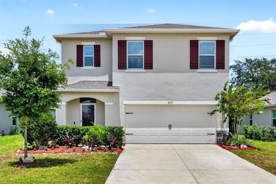 Front exterior of a new home in , Ormond Beach, FL, highlighting curb appeal (Image 1). Front exterior of a new home in , Ormond Beach, FL, highlighting curb appeal (Image 1).